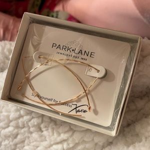 Gold twizzler earrings from Park Lane